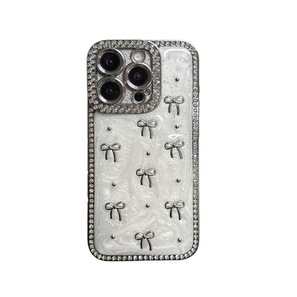 Crystal Bow iPhone Case – Diamond-Studded Design with Elegant Ribbon Motif, Glossy Finish, Perfect for iPhone 16/15/14/13, Fashionable and Protective Gift for Her